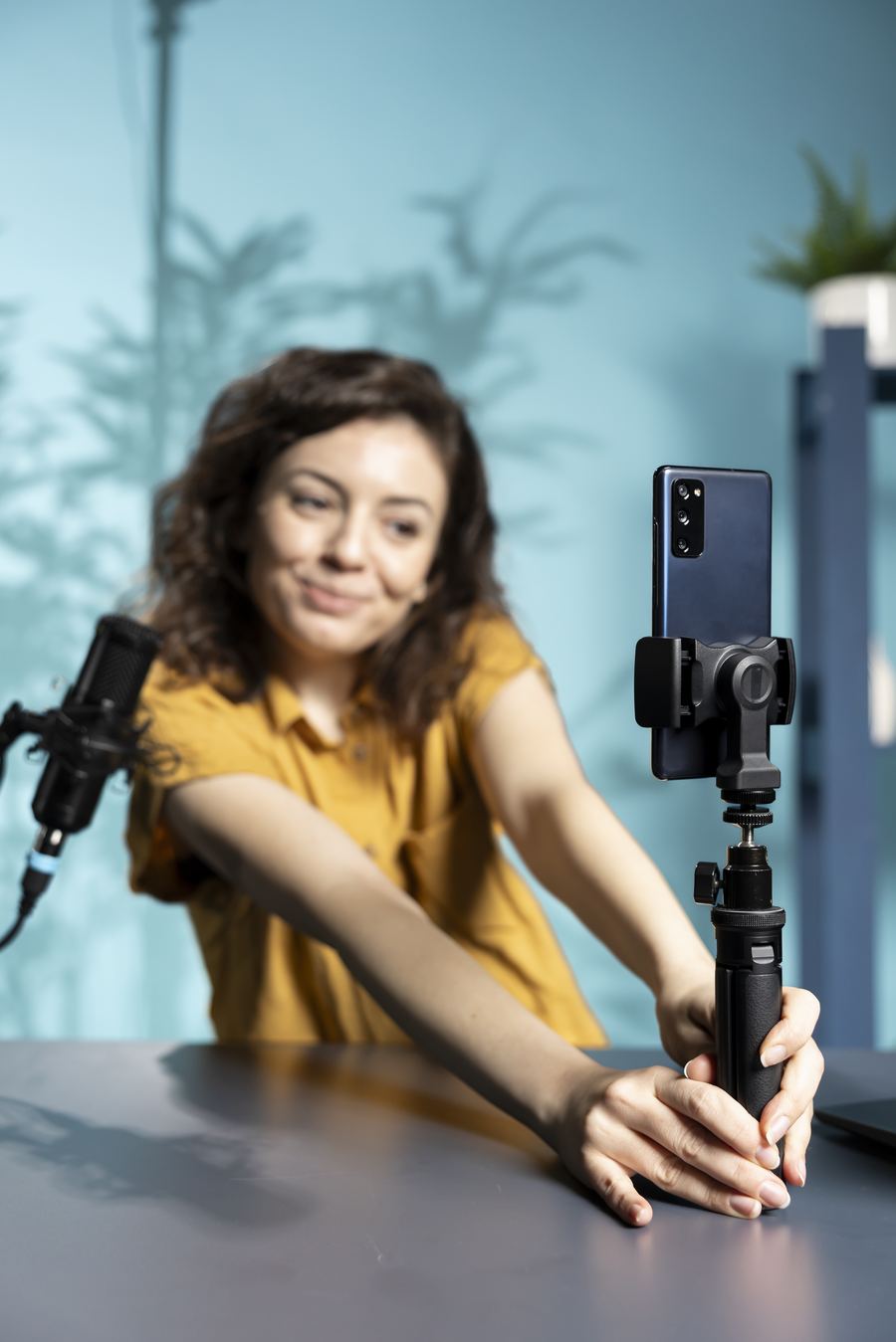 Woman recording a video on her phone