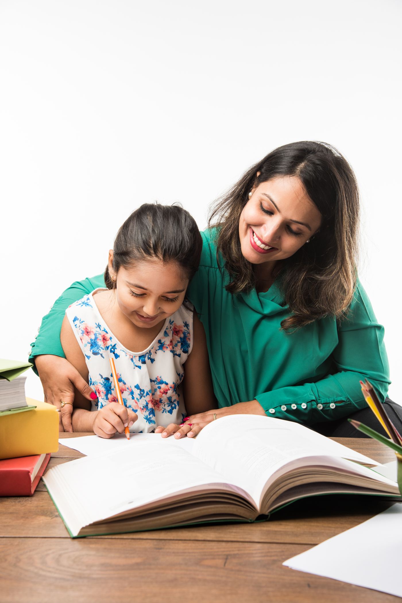 Mother and daughter learning together at a study table